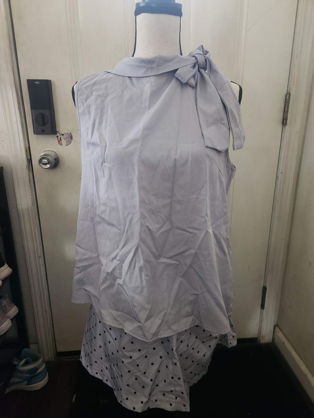 Sleeveless Bow-Shoulder Blouse With A Poke Above Knee Skirt